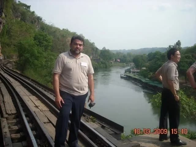 Railway bridge overlooking a river during a business journey through Thailand in 2009