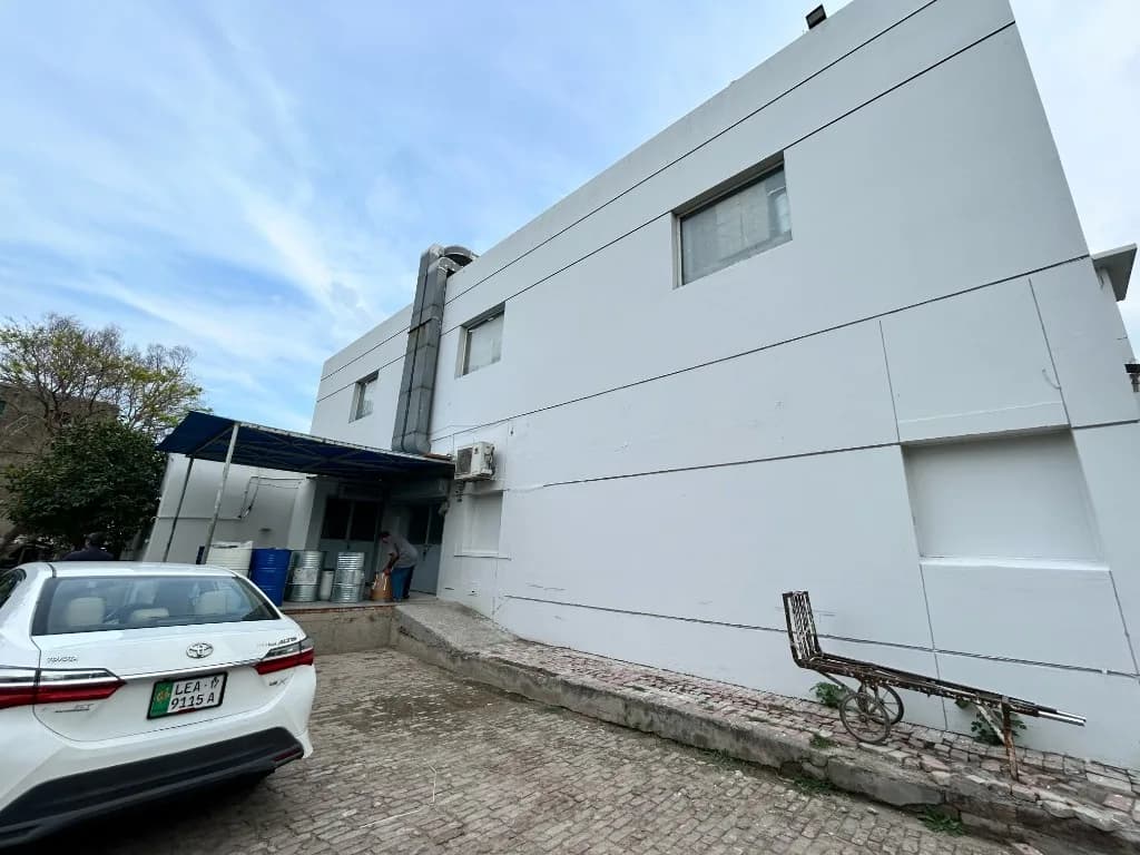 Side exterior of the Prix Pharmaceutica facility and service entrance